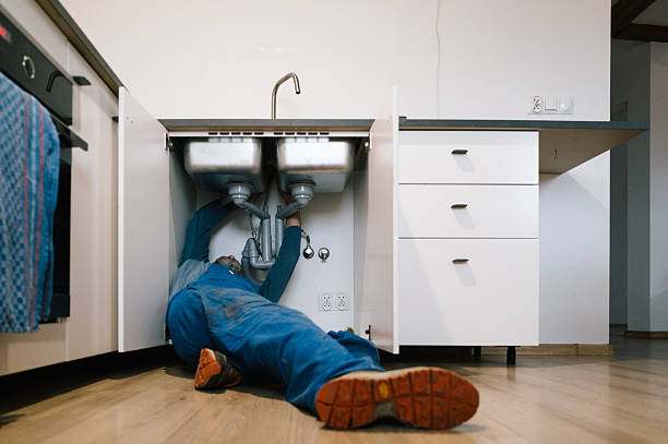 Professional Drain Cleaning technician working in Kirkland, WA